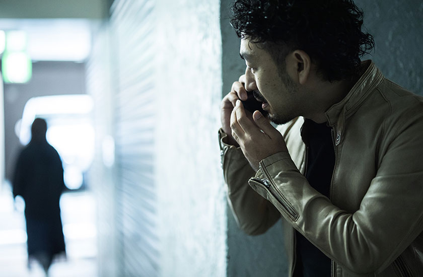 浮気調査中の探偵